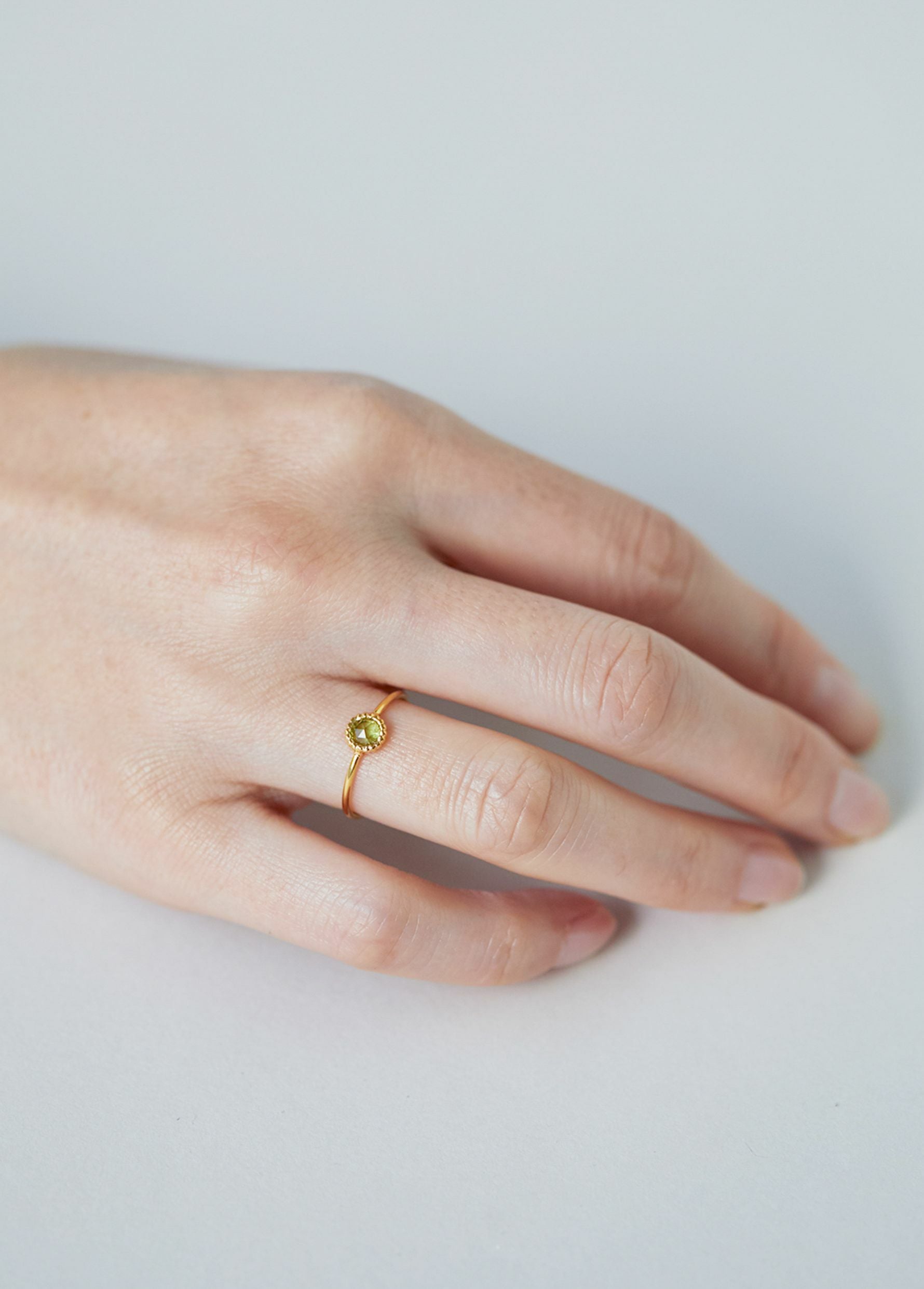 Peridot Dot Bezel Ring