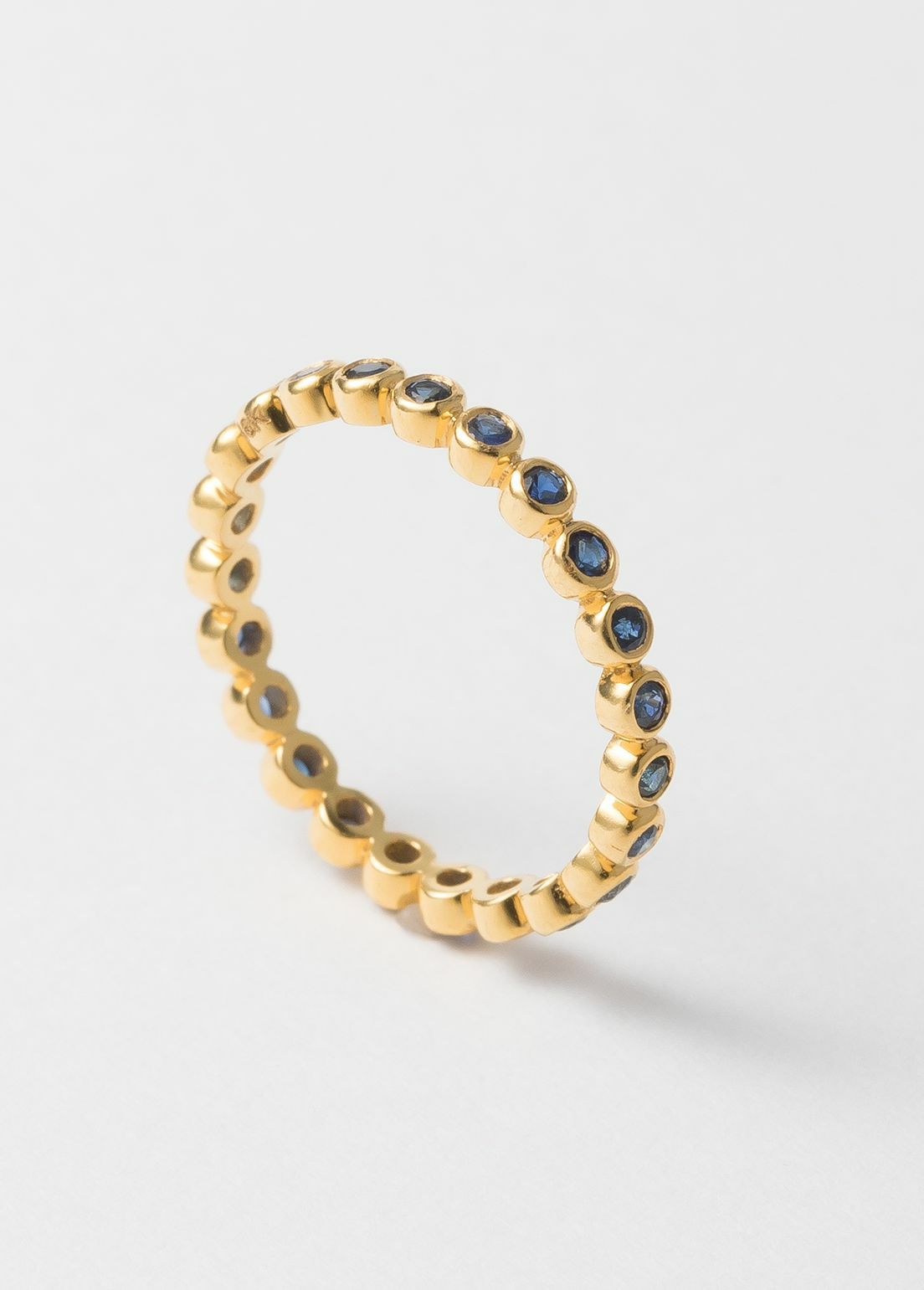 Tiny Blue Sapphire Gem Eternity Ring