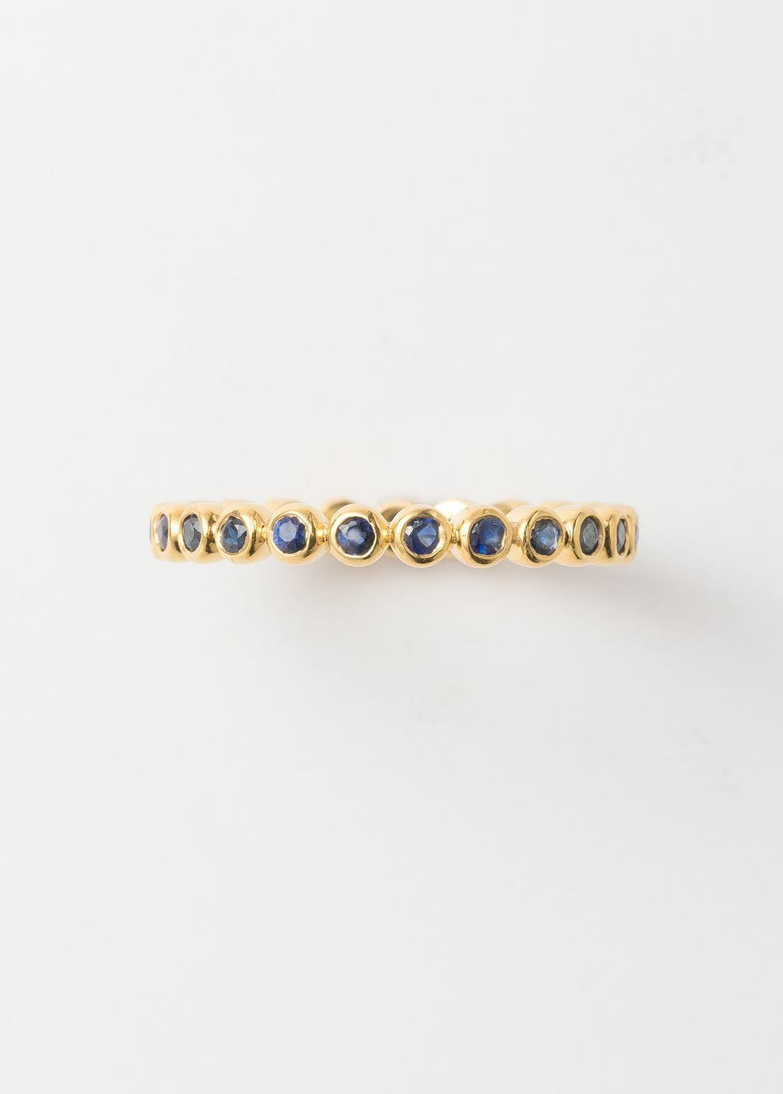 Tiny Blue Sapphire Gem Eternity Ring